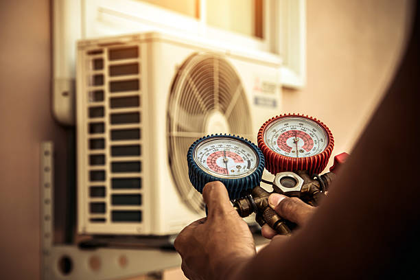 Professional Air Conditioning Service technician working in Frankfort, IN